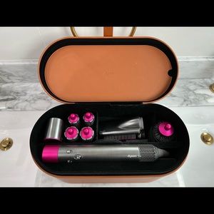 Dyson Airwrap with storage case, non-slip mat, 8 attachments, and cleaning brush